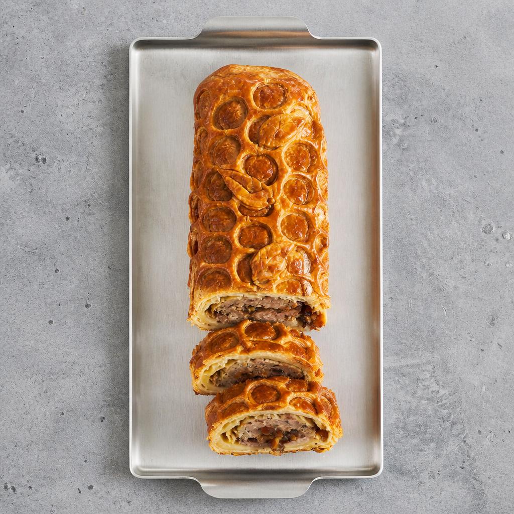 83. Tesco Finest Chef’s Collection Hand Finished Melt in the Middle Pork Wellington 1kg (Serves 10)